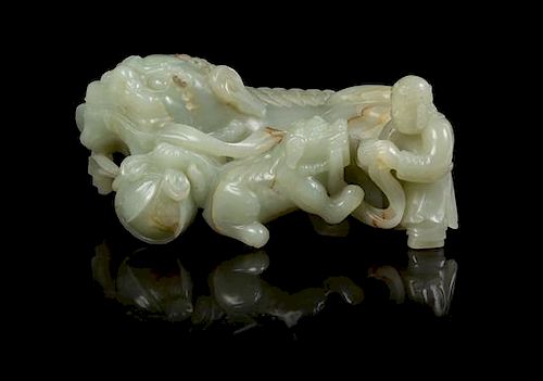 A Celadon Jade Figural Group LATE 19TH/EARLY 20TH CENTURY Length 6 1/4 inches.