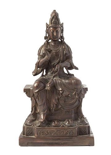 * A Bronze Figure of Guanyin Height 14 1/4 inches.