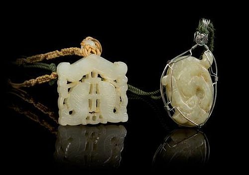 * Two Carved Jade Pendants Length of first 1 7/8 inches.