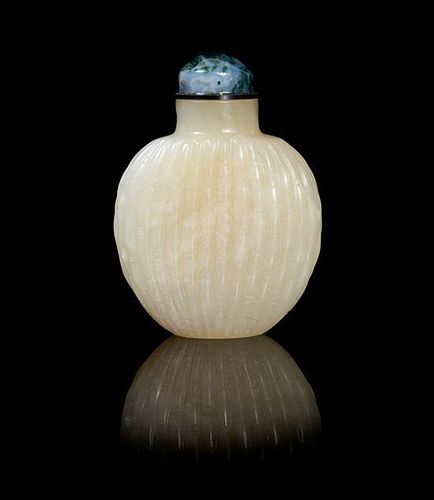 A Jade Snuff Bottle POSSIBLY 19TH CENTURY Height 2 5/8 inches.