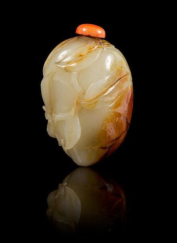 * A Carved Jade Snuff Bottle Height 2 3/8 inches.