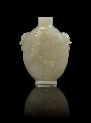 A Carved Jade Snuff Bottle Height 2 3/8 inches.