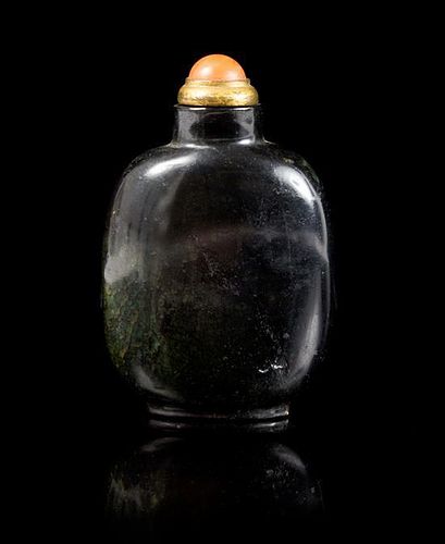 * A Black Jade Snuff Bottle Height 3 1/2 inches.