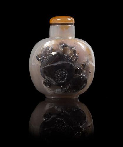 * A Carved Agate Snuff Bottle SUZHOU SCHOOL Height 2 1/4 inches.