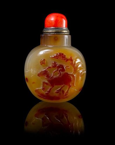 A Carved Agate Snuff Bottle Height 3 1/8 inches.
