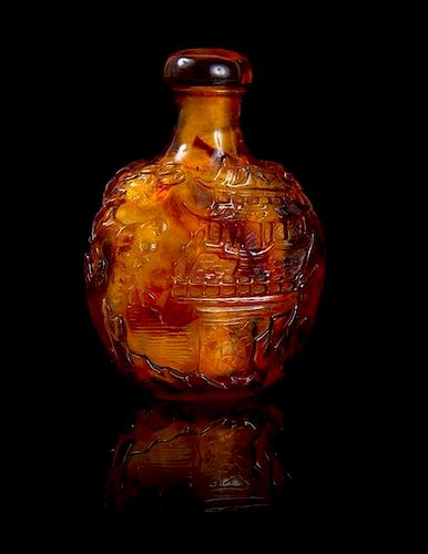 * An Amber Snuff Bottle Height 2 7/8 inches.