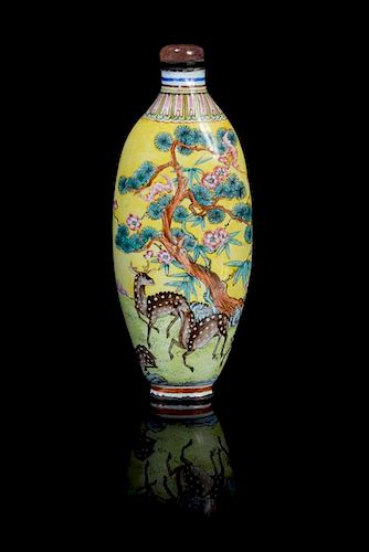 An Enamel on Copper Snuff Bottle Height 3 5/8 inches.