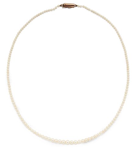 A CERTIFIED NATURAL SALTWATER PEARL NECKLACE, the graduated
