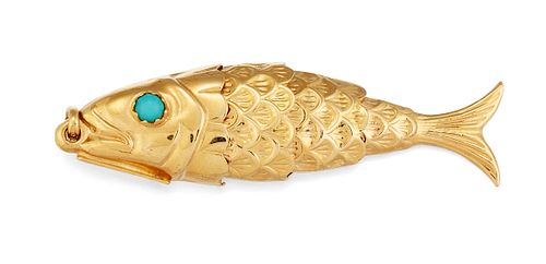 A MODERN GOLD ARTICULATED FISH PENDANT, with turquoise set 