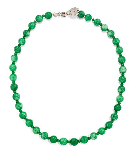 A JADE BEAD NECKLACE WITH DIAMOND AND EMERALD DRAGON HEAD C