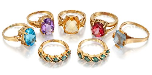 SEVEN 9 CARAT GOLD GEMSET RINGS, to include a pair of green