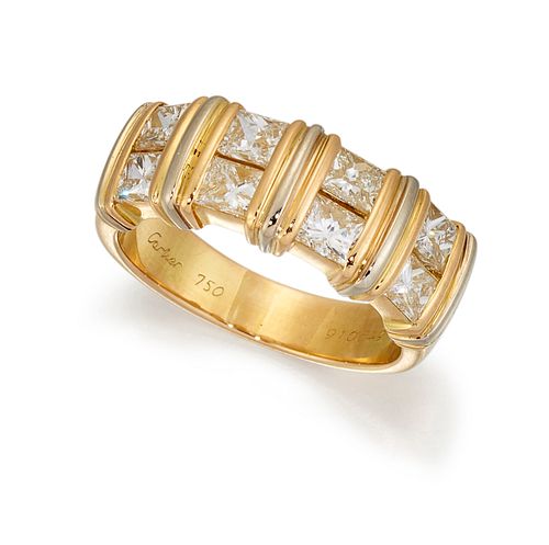 A CARTIER 18 CARAT GOLD AND DIAMOND RING, the half hoop rin