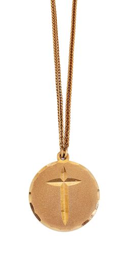 A 9 CARAT GOLD PENDANT AND CHAIN, the round pendant hallmar