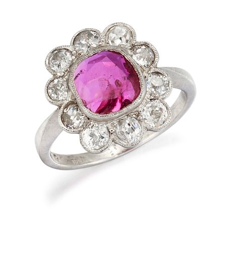 A PLATINUM RUBY AND DIAMOND CLUSTER RING, the cushion cut r