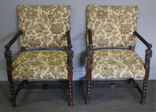 Pair of Chairs with Figural Carved Arms.