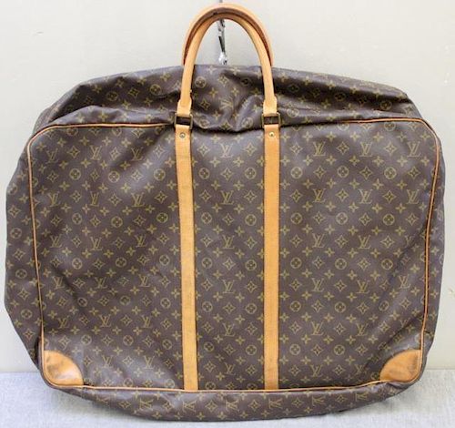 Vintage Louis Vuitton Leather Storage Bag.