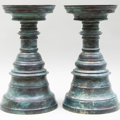 Pair of Large Patinated Metal Candle Stands