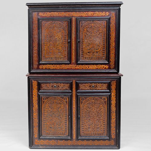 Continental Relief Carved Maple and Ebonized Cupboard, Austrian or German