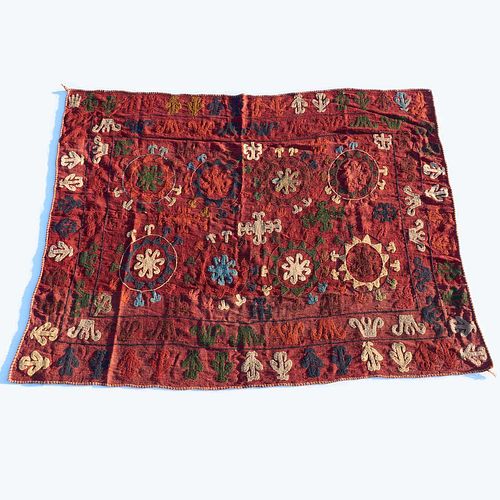 Red Uzbeki embroidered carpet