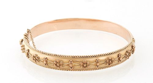 English Victorian 9K Rose Gold Etruscan Style Hinged Bangle Bracelet, early 20th c., the top with relief decoration, flanked by rope...