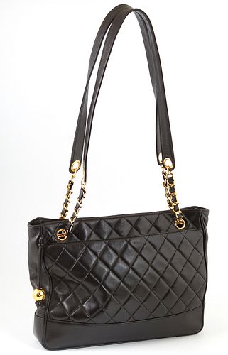 Chanel Black Quilted Calf Leather Shoulder Bag, c. 2020, with double gold chain handles interlaced with black leather, the interior...