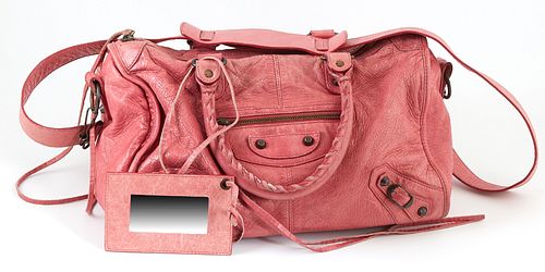 Balenciaga Light Pink Distressed Leather Maxy Twiggy Shoulder Bag, the exterior with aged brass hardware and a front zip compartment...