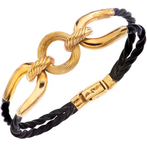 WRISTBAND WITH TEXTILE. 18K YELLOW GOLD