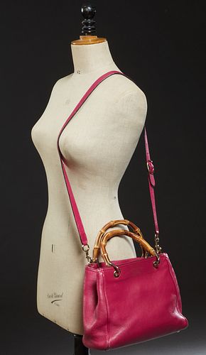 Gucci Magenta Grained Calf Leather 25 Mini Bamboo Shopper Handbag, the bamboo handles with golden hardware and adjustable leather st...