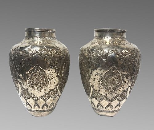 A Pair of Persian Isfahan Silver plated Urns. 