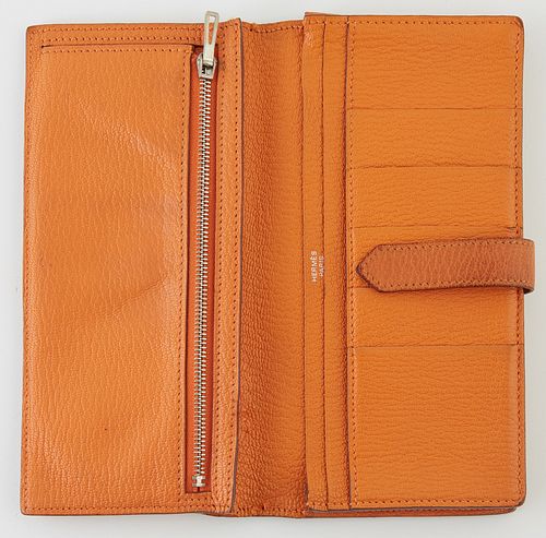 Hermes Orange Chevre Myzore Bearn Wallet, the calf leather with palladium plated hardware and pull through closure, opening to one c...