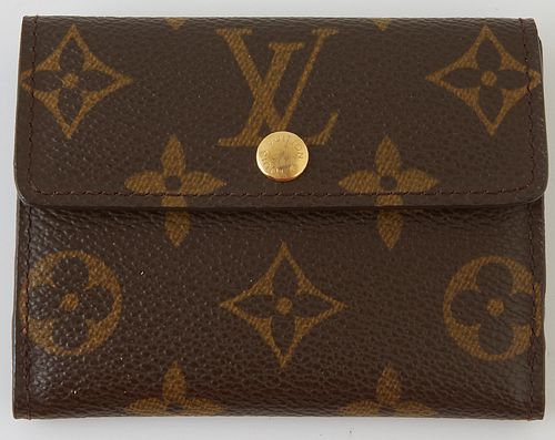 Louis Vuitton Card Organizer, the brown monogram coated canvas with golden brass snap, opening to three card compartments, with exte...