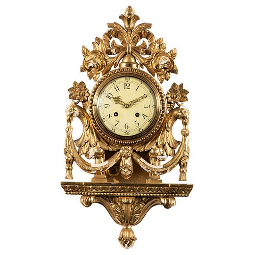 A Giltwood Cartel Clock