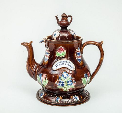 English Relief-Decorated Brown-Glazed Bargeware Teapot and Cover