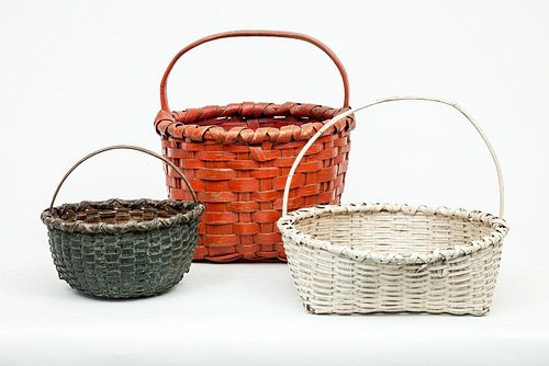 Red-Stained Woven Wood Splint Basket, a Dark Green-Stained Basket, and a White Wicker Basket