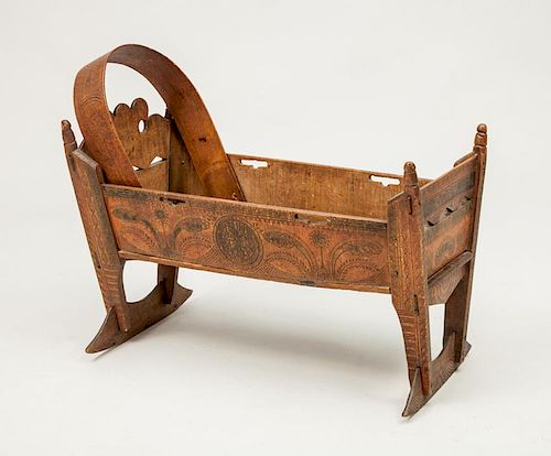 Continental Carved and Stained Rocking Cradle