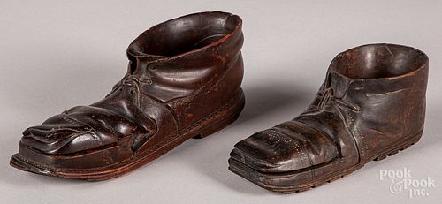 Two carved shoe-form match holders