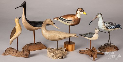 Six carved shorebird decoys