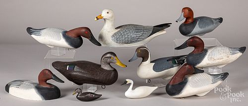 Eight carved and painted duck decoys