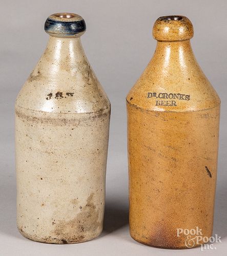 Two stoneware beer bottles