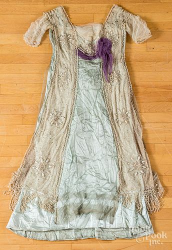 Hand sewn silk, lace, and pearl mounted dress