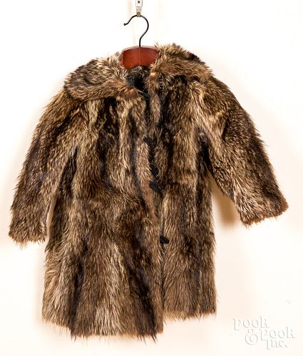 Early hand sewn child's racoon fur coat.