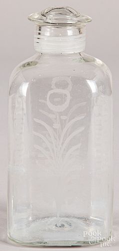 Etched colorless glass bottle, 19th c.