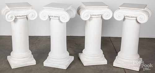 Set of four plaster pedestals