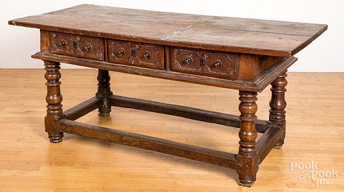 Continental carved walnut tavern table