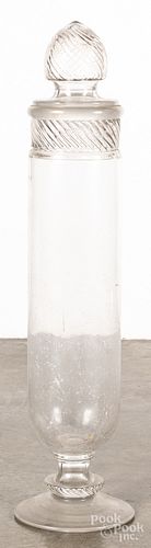 Tall country store colorless glass show jar