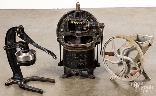 Three cast iron mechanical tools