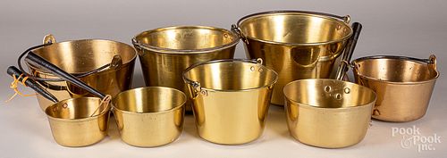 Eight brass buckets and pans, 19th c.