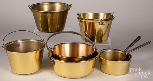 Sixteen brass buckets and pans, 19th c.