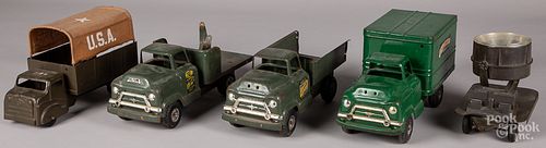 Four pressed steel trucks