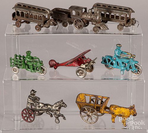 Group of small cast iron toys
